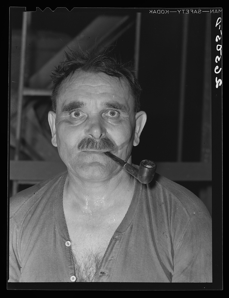 Steel worker in Pittsburgh steel mill. Pittsburgh, Pennsylvania