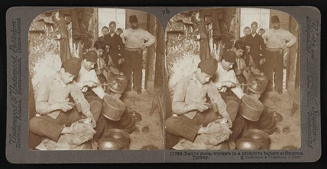Native metal workers in a primitive factory at Smyrna, Turkey