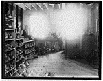 View of Berliner Gramophone factory, worker with unassembled Gramophone components