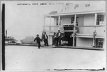 Immigrants going aboard Ellis Island barge