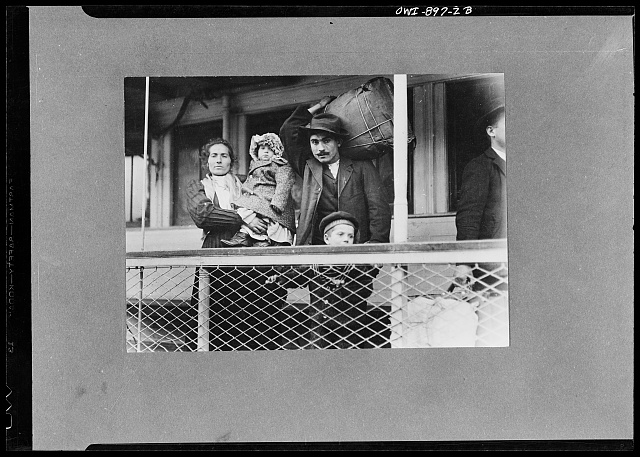 [Italian immigrant family on ferry, leaving Ellis Island]