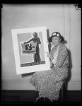[Woman holding poster "Abolish Prohibition!"]