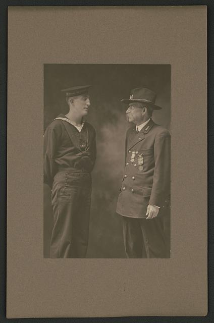 [Unidentified Civil War veteran and unidentified World War I sailor]