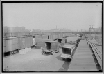 Railroads. Railroad yard with trucks and railroad cars I