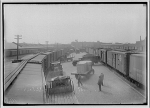 Railroads. Railroad yard with trucks and railroad cars III